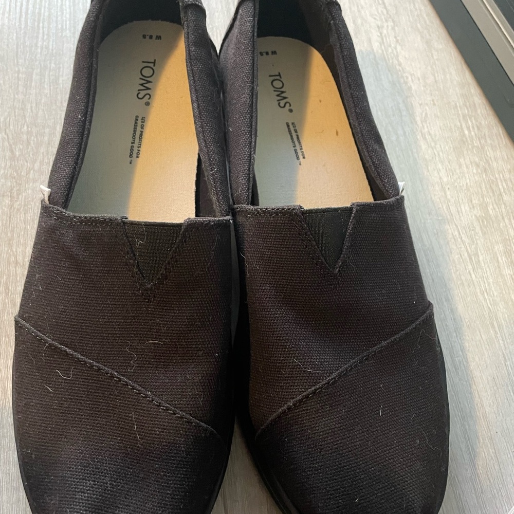 TOMS Classic Black Canvas Slip-Ons
